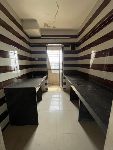Kitchen in 1 BHK Apartment at Lodha Palava Downtown, Dombivli East – for Rent