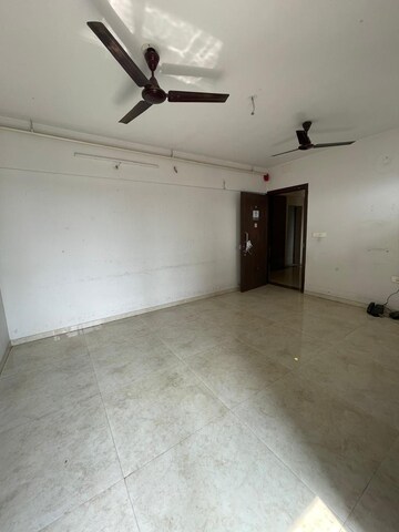 Living Room in 1 BHK Apartment at Lodha Palava Downtown, Dombivli East – for Rent