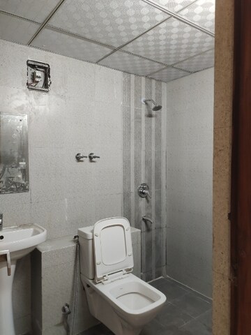 Bathroom in 3 BHK Apartment at Sector 19b Dwarka – for Rent