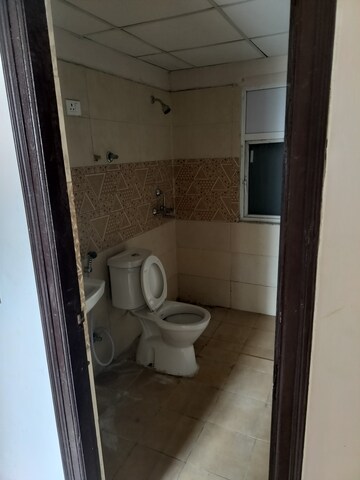 Bathroom in 3 BHK Apartment at Amrapali Golf Homes, Sector 4 Greater Noida – for Rent