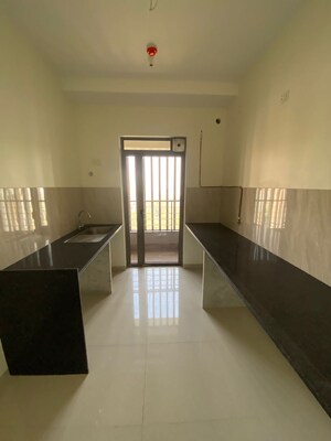 Kitchen in 2 BHK Apartment at Kalpataru Paramount, Kapur Bawdi – for Sale
