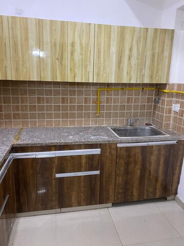 Kitchen in 2 BHK Apartment at Panchsheel Greens II, Sector 16 Greater Noida – for Rent