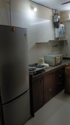 Kitchen in 3 BHK Apartment at K Hemani Login, Kandivali West – for Sale