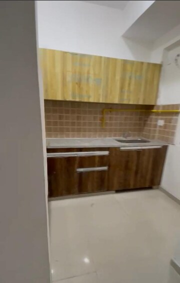 Kitchen in 2 BHK Apartment at Mahagun Mywoods, Sector 16c Greater Noida – for Rent