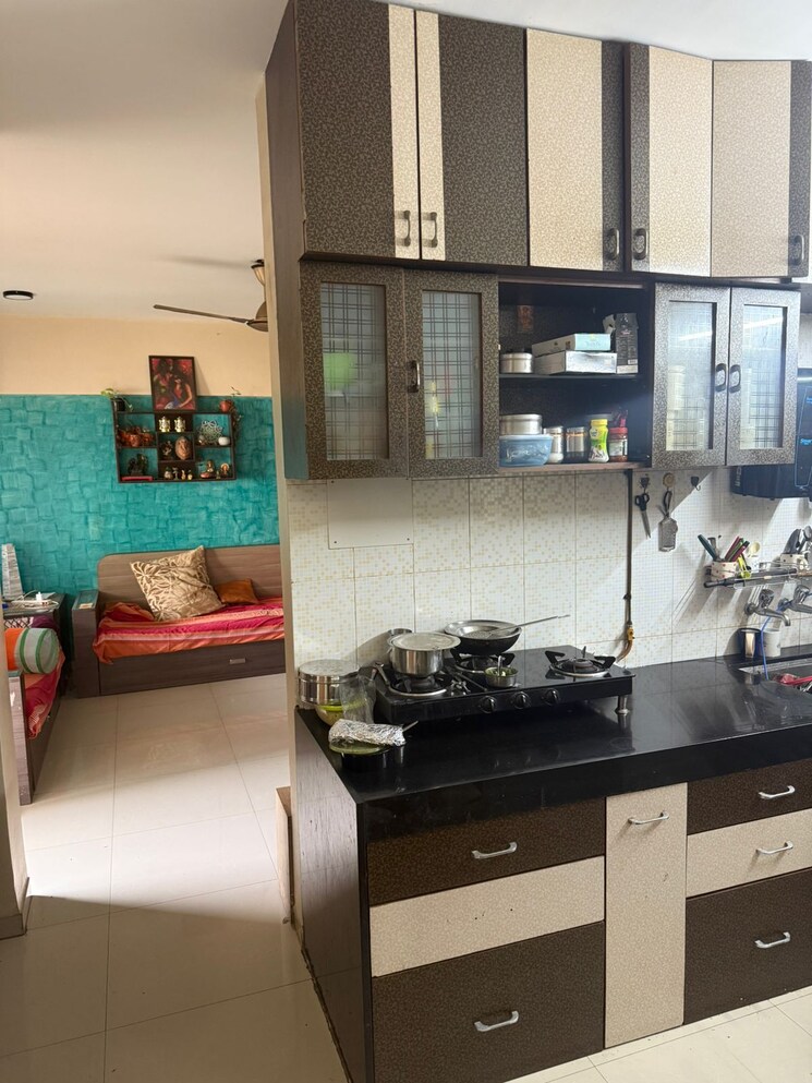 Kitchen, shriniwas-serene-county 2 Bedroom 1000 Sq.Ft. Apartment In Nanded Pune 9095434