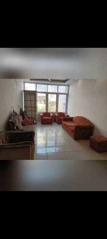 Living Room in 4 BHK Apartment at Ahinsa Khand 2 – for Sale