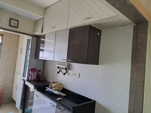 Kitchen in 2 BHK Apartment at Bhanushanti Complex, Malad East – for Sale