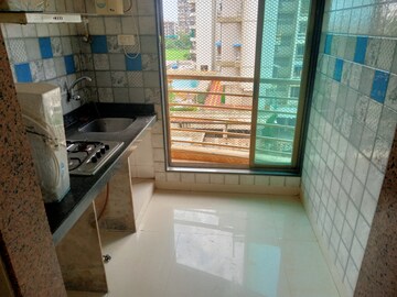 Kitchen in 1 BHK Apartment at Paradise Sai Riverdale, Taloja – for Sale