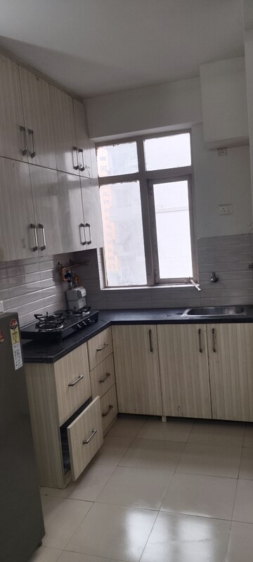 Kitchen in 1 BHK Apartment at Auric City Homes, Sector 82 – for Rent