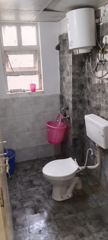 Bathroom in 1 BHK Apartment at Auric City Homes, Sector 82 – for Rent