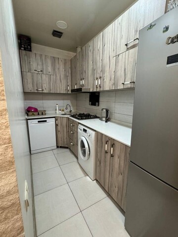 Kitchen in 3 BHK Apartment at Abhinav Apartments, Vasundhara Enclave – for Sale