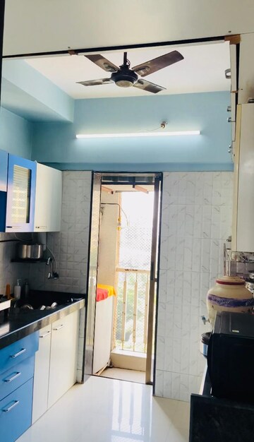 Kitchen in 2 BHK Apartment at Heena Presidency, Mira Road – for Sale