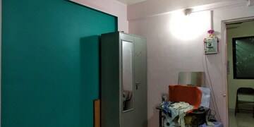 Master Bedroom in 1 BHK Apartment at Urmila CHS Dhankawadi, Dhankawadi – for Rent