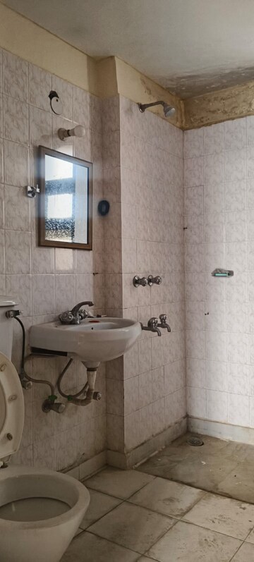 Bathroom in 3 BHK Apartment at Joy kunj Apartment, Sector 56 – for Rent