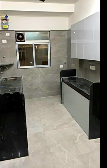 Kitchen in 3 BHK Apartment at Yamuna CHS Mulund West, Mulund West – for Rent