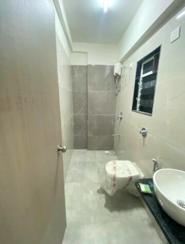 Bathroom in 3 BHK Apartment at Yamuna CHS Mulund West, Mulund West – for Rent