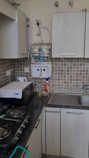 Kitchen in 1 RK Apartment at Church View Apartments, Sector 29 – for Rent