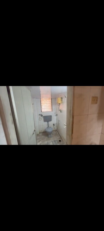 Bathroom in 2 BHK Apartment at Abhinav Apartment, Vile Parle East – for Rent