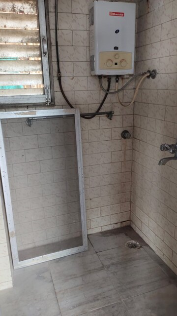 Bathroom in 1 BHK Apartment at Ashford Hema Park, Bhandup East – for Rent