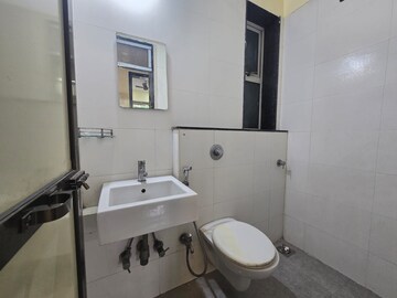 Bathroom in 1 BHK Apartment at Vasant Fiona, Pokhran Road No Two – for Rent