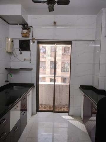 Kitchen in 1 BHK Apartment at NICCO Ashok Smruti 2, Kasarvadavali – for Rent