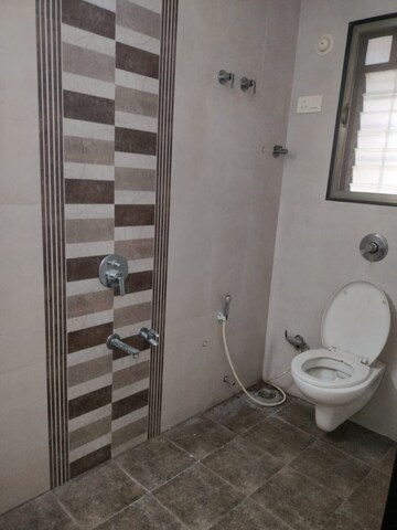 Bathroom in 1 BHK Apartment at NICCO Ashok Smruti 2, Kasarvadavali – for Rent