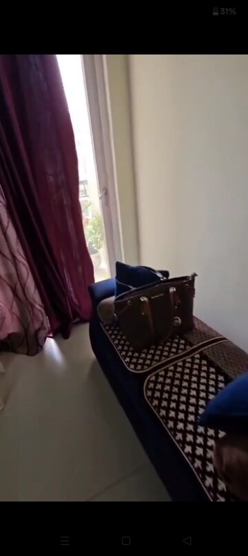Living Room in 2.5 BHK Apartment at Trident Embassy, Sector 1 Greater Noida – for Rent
