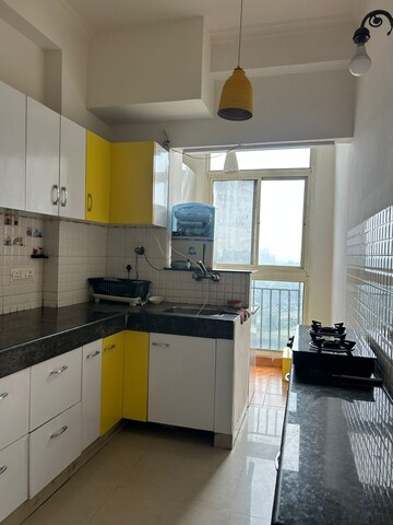 Kitchen in 2.5 BHK Apartment at Antriksh Golf View, Sector 78 – for Rent