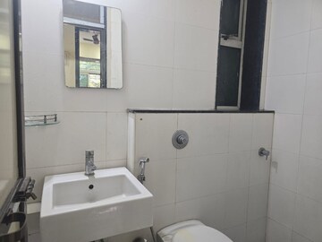 Bathroom in 1 BHK Apartment at Sheth Fiona, Pokhran Road No Two – for Rent