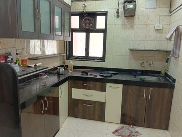 Kitchen in 1 BHK Apartment at Ahimsa Tower, Malad West – for Rent