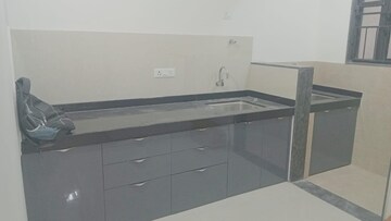 Kitchen in 1 BHK Apartment at Kohinoor Viva City, Dhanori – for Rent