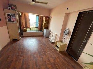 Living Room in 3 BHK Apartment at Ekta Meadows, Borivali East – for Sale