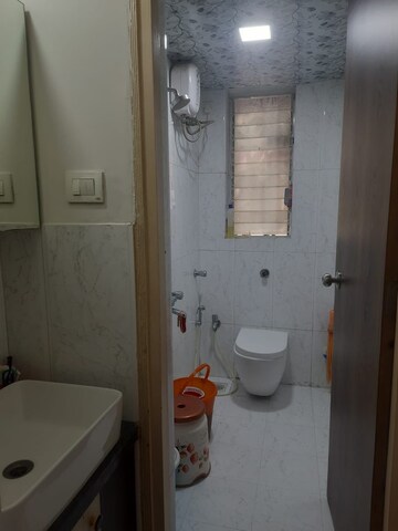 Bathroom in 2.5 BHK Apartment at Atlanta Enclave, Shilphata – for Sale