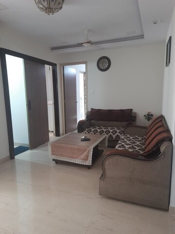 Living Room in 2.5 BHK Apartment at Atlanta Enclave, Shilphata – for Sale