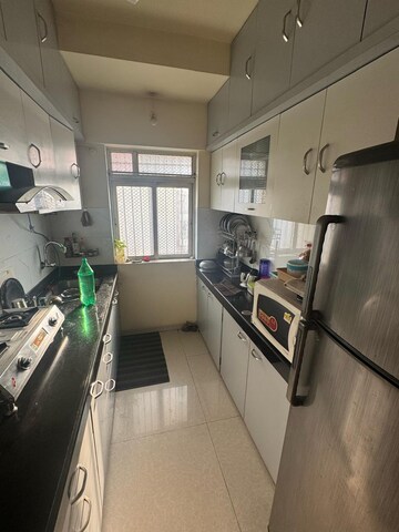 Kitchen in 2.5 BHK Apartment at Atlanta Enclave, Shilphata – for Sale