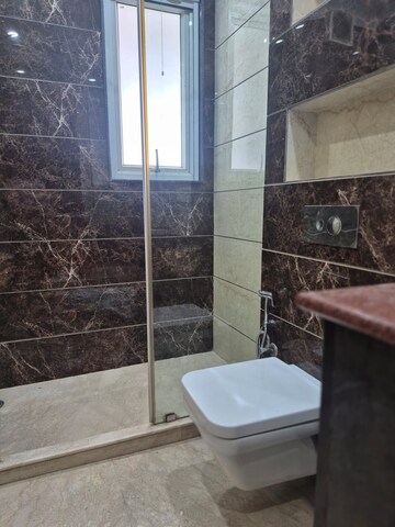 Bathroom in 4 BHK Builder Floor at DLF Queens Court, Greater Kailash ii – for Rent