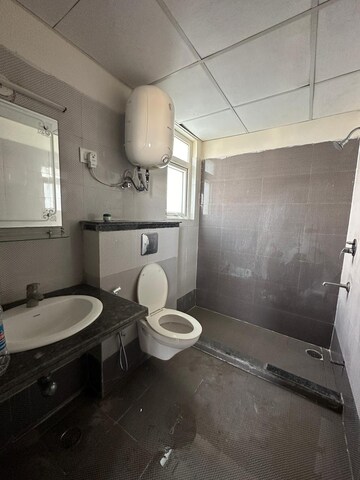 Bathroom in 3 BHK Apartment at NK Sharma Savitry Greens, Lohgarh – for Rent