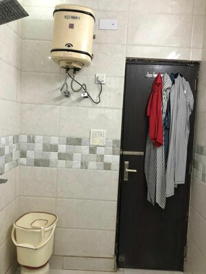 Bathroom in 3.5 BHK Builder Floor at Saraswati Garden – for Sale
