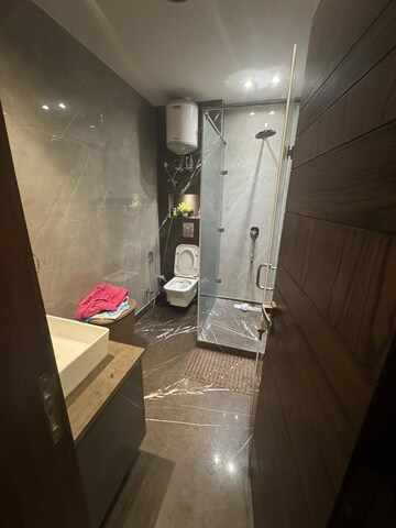 Bathroom in 4 BHK Builder Floor at DLF Queens Court, Greater Kailash ii – for Rent