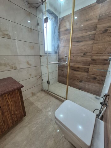 Bathroom in 4 BHK Builder Floor at DLF Queens Court, Greater Kailash ii – for Rent