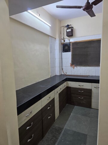 Kitchen in 2 BHK Apartment at Gorai Shree Om CHS, Gorai – for Rent