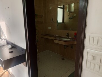 Bathroom in 4 BHK Apartment at Abhinandan CGHS, Sector 51 – for Rent