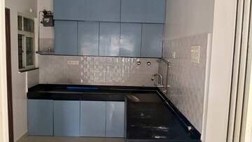 Kitchen in 2 BHK Apartment at Majestique Landmark Miami, Dhayari – for Rent