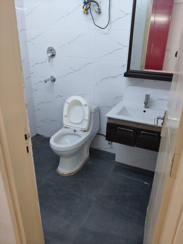 Bathroom in 3 BHK Apartment at Karamvir Towers, Sector 52 – for Rent