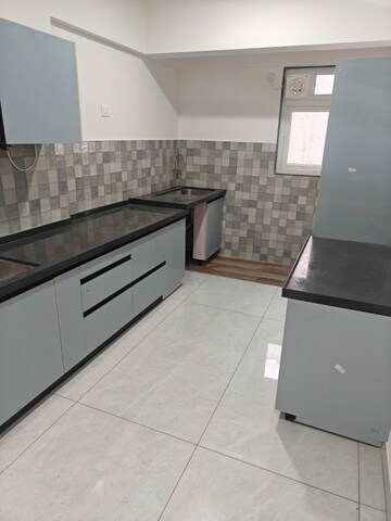 Kitchen in 2 BHK Apartment at D And T Mountain View CHS, Senapati Bapat Road – for Rent