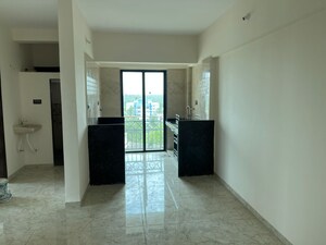 Living Room in 2 BHK Apartment at Sunteck Beach Residences, Vasai West – for Sale