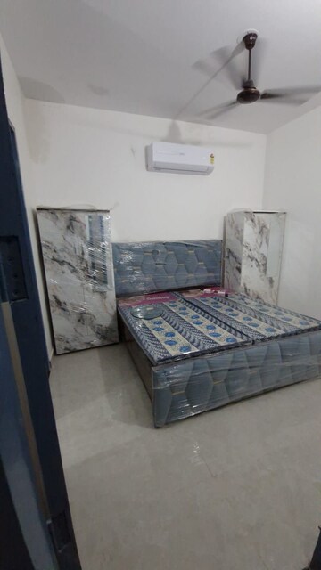 Bedroom in 2 BHK Apartment at Raglan Gulmohar Trends, Dhakoli – for Rent