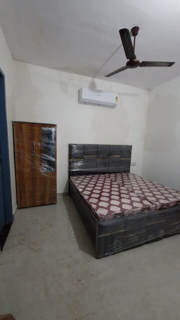 Bedroom in 2 BHK Apartment at Raglan Gulmohar Trends, Dhakoli – for Rent