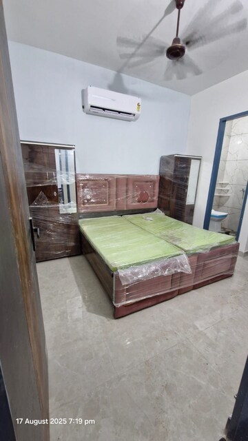 Bedroom in 2 BHK Apartment at Raglan Gulmohar Trends, Dhakoli – for Rent