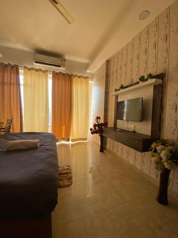 Living Room in Studio Apartment at Gaur City Center, Sector 4 Greater Noida – for Rent